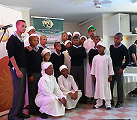 youth presenting zikr and poetry to the elderly 
