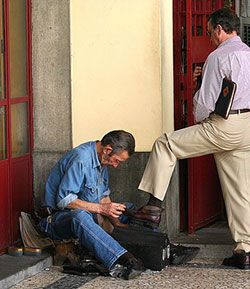 man shining shoes